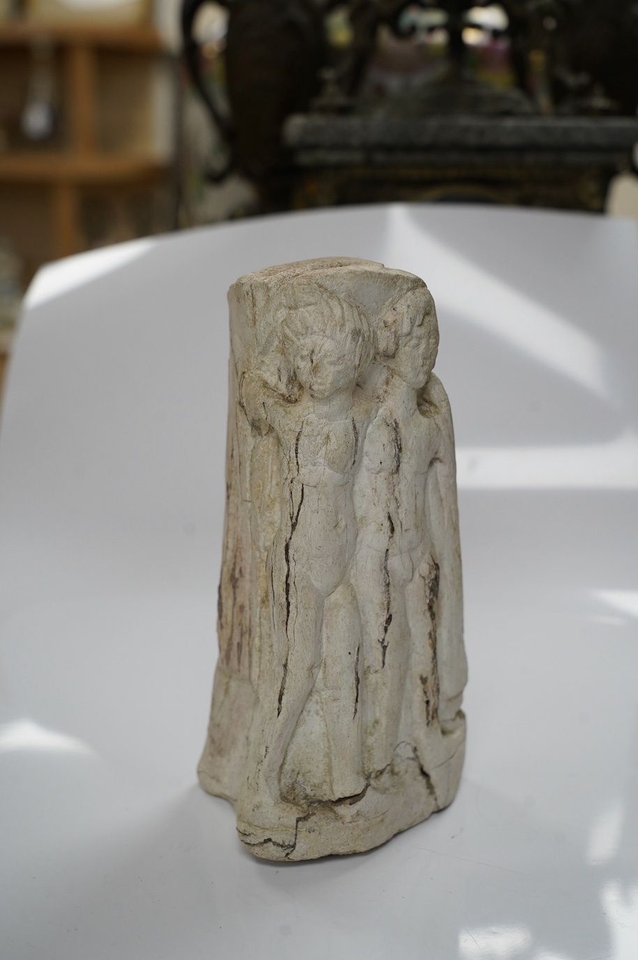 A Devotional bone? figural column, possibly Roman, and depicting 'The Three Graces', 17cm high. Condition - good considering age